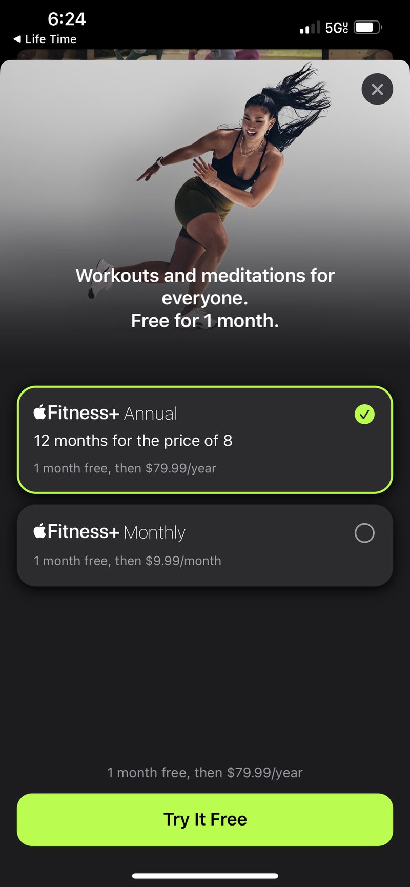 Apple Fitness+ app paywall displaying a subscription offer with monthly and yearly pricing options